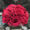 Sweet and Simple arrangement of Hot Pink Roses in a Clear Cube