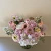 Elegant and whimsical arrangement of gorgeous pastels mixed with hints of light