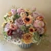 Make someone happy with the stylish arrangement of golden, dusty, blush colors