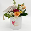 Celebrate their milestone in full bloom.

Honor your grad with this joyful arrangement