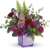 A serene style statement in lush lavender roses and fresh maroon blooms