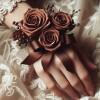 Indulge in the luxurious elegance of our Chocolate Decadence Wrist Corsage and