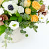 Wild, lush and romantic. This gorgeous arrangement of Anemones and Mushrooms has
