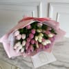 50 Tulips wrapped in craft paper

*This bouquet does not include a glass