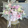 Big Welcome Little One !
A charming basket overflowing with soft, pastel blooms