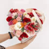 Mixed Flowers Heart Box and Ribbon. On the inside the box is