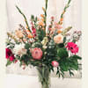 A stunning combination of peach, coral and pink blooms 
