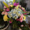 Graceful and full of soft color, Enchanted Beauty is a bouquet that