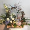 Welcome a new baby boy to the world with this arrangement including