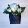 Add a modern twist to your formal attire with our Pocket Boutonniere