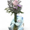 Bunny Hugs and Blooms is a charming and heartwarming arrangement that combines