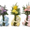 Bunny Hugs and Blooms is a charming and heartwarming arrangement that combines