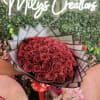 Glitter red rose bouquet is a captivating arrangement designed to exude romance