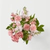 Pink roses, carnations and White stock flowers. A traditional selection in a