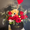 Arrangement with a bear plush and chocolates is Deluxe.
Something different and cute