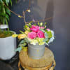 Beautiful Mixed Arrangement in a box with a compact yet organic style.