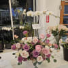 Great things about this arrangement is -
1) It has a real orchid