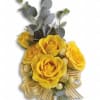 Mini yellow spray roses with eucalyptus accents, finished with a yellow ribbon.