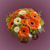Celebrate the beauty of fall with our Autumn Embrace flower arrangement! Featuring