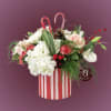Celebrate the magic of the season with our Candy Cane Delight floral