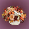 Transform your space with our Chic Autumn Bliss floral arrangement, elegantly nestled