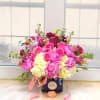 beautiful arrangement with seasonal flowers - peonies and lilac  