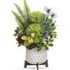 Gorgeous green blooms and a mod, mid-century ceramic planter add up to