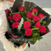 Red roses with eucalyptus leaves in our famous style bouquet. Best for