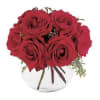 Red roses in bowl vase with seeded eucalyptus