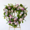 Sympathy Funeral open heart easel Spray with lavender and light pink blooms