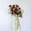 White and Red color cross funeral spray, with hydrangeas, roses, and fillers.