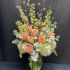 White Hydrangeas, Peach Roses, Peach Carnations, White Stocks, White Delphiniums, Peach Mums