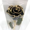 A real rose preserved to last and then trimmed with real 24kt
