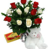 A gorgeous bouquet of 12 red and white roses, arranged in a
