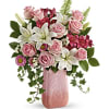Inspired by the cherry quartz gemstone, this boho-beautiful, hand-blown art glass vase