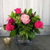 A beautiful cube filled with pink Roses, Moon Vista Carnations and adorned