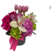 Upscale and uptown. This fantastic arrangement is a beauty and a half