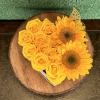 Roses and sunflowers on a heart shape box
