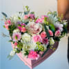Arranged in a beautiful heart shaped box, the premium fresh cut large