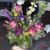 This arrangement is uniquely crafted for that individual who loves beautiful purple