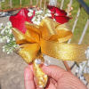 Pick the color roses and color ribbon and I will make you