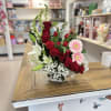 Surprise that special person with this beautiful  floral arrangement, with 9