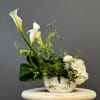 Introducing our enchanting &quot;Enchanted Calla Garden.&quot; This exquisite creation features a harmonious