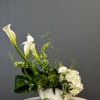 Introducing our enchanting &quot;Enchanted Calla Garden.&quot; This exquisite creation features a harmonious