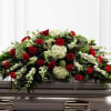 Elegant red &amp; white casket blanket arrangement. Can be designed for half