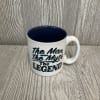 Fresh cut flowers in a keepsake ceramic mug. Flowers and colors may