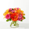 Soiree Bouquet
As glamorous and colorful as a seasonal soiree, these blooms bring