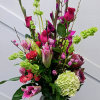 Bright fuchsias, hot pinks, shades of lime and orange make up this