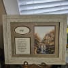 A beautifully detailed frame encompasses a thoughtful sentiment of the memory of