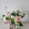 Pink and white gardeny, spring florals including hydrangea and lisianthus in a